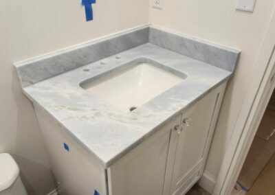 Single Vanity done with 3cm Aqua Blue Marble in Delray Beach